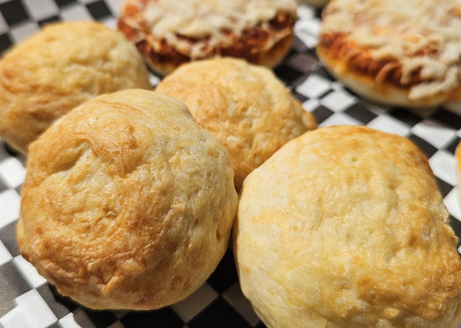 Freshly baked savoury pastries and mini pizzas